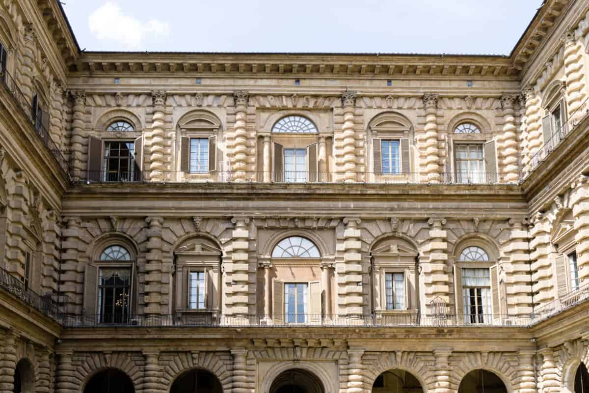 Historic building with ornate architecture and arched windows.